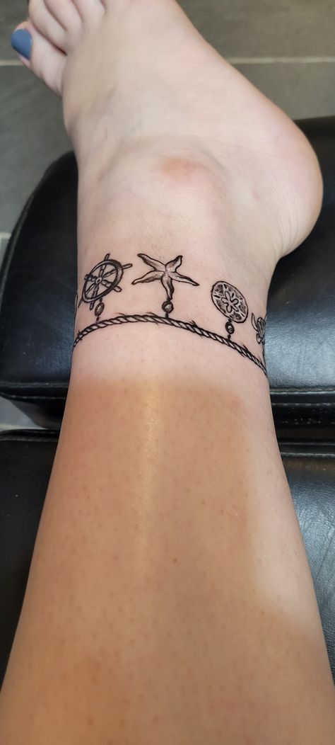 Ocean Anklet Tattoos For Women, Beachy Anklet Tattoos, Ankle Tattoos For Women Anklet Ideas Charm Bracelets, Beachy Ankle Tattoos, Beachy Hand Tattoos, Anklet Bracelet Tattoo, Ocean Bracelet Tattoo, Beach Foot Tattoos For Women, Floral Anklet Tattoos For Women