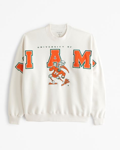 Men's University of Miami Graphic Crew Sweatshirt | Men's Tops | Abercrombie.com University Of Miami Sweatshirt, Unique Sweatshirt Designs, Cute College Apparel, Cool Sweatshirt Designs, Merch Shoot, Male Features, Bday Wishlist, Colorful Sweatshirt, Unique Sweatshirt