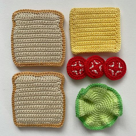 Crochet Sandwich/ Crochet Play Food/ Pretend Food/ Amigurumi Food/ Kitchen Decor/ Crochet Food. 7 -piece handmade crochet vegetarian sandwich, made from 100% cotton yarn. Include: 2 slices of bread; 3 slices of tomato; 1 slice of cheese; 1 lettuce leaf. (Wooden box and fruits are not included) CARE - Hand wash only. Soak in warm, soapy water without rubbing. Let dry in the open air. Do not machine wash. IMPORTANT NOTES - Despite all the care given to photos, colors may be slightly different depe Sandwich Crochet, Crochet Sandwich, Food Amigurumi, Crochet Play Food, Amigurumi Food, Pretend Food, Decor Crochet, Crochet Octopus, Crochet Food