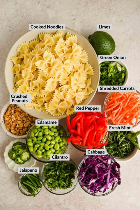 This Thai Pasta Salad recipe combines the vibrant flavors of fresh vegetables, fragrant herbs, and chewy noodles, tossed in a zesty, homemade peanut dressing. It's a refreshing and satisfying dish that offers a perfect balance of tangy, spicy, and savory notes. Peanut Pasta Recipes, Thai Spaghetti Salad With Peanut Dressing, Thai Peanut Pasta Salad, Thai Pasta Recipes, Peanut Pasta Salad, Thai Peanut Noodle Salad, Spicy Pasta Salad, Thai Pasta Salad, Asian Pasta Salad