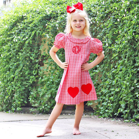 This adorable Sweet Valentine Chloe Dress is the perfect choice for a Valentine's Day school party. This A-line Chloe dress features three heart appliqués on red plaid fabric, complete with an adorable ruffle collar, pleated detail, and charming bishop sleeves. You can complete your Valentine's look by adding a monogram!Kids outfit | kids closet | trending | kids fashion trends | fall fashion | fall 2023 | smocked clothes | kids smocked clothes fall | what to wear | closet for kids Closet For Kids, Applique Hearts, Fashion Fall 2023, Kids Smock, Monogram Kids, Smocked Clothes, Fashion Trends Fall, Chloe Dress, Kids Fashion Trends