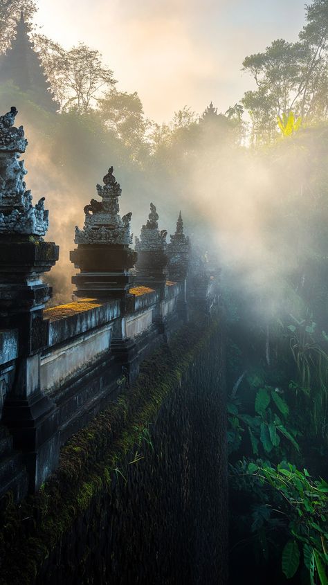 Mystical Bali temple at dawn wrapped in morning mist; ideal for philosophical Sagittarians. Discover ancient stone carvings, jungle aura, and incense in professional travel photography. Astro Travel, Bali Temple, Bali Travel Photography, Ancient Stone, Morning Mist, Bali Travel, 2025 Vision, Stone Carving, Incense