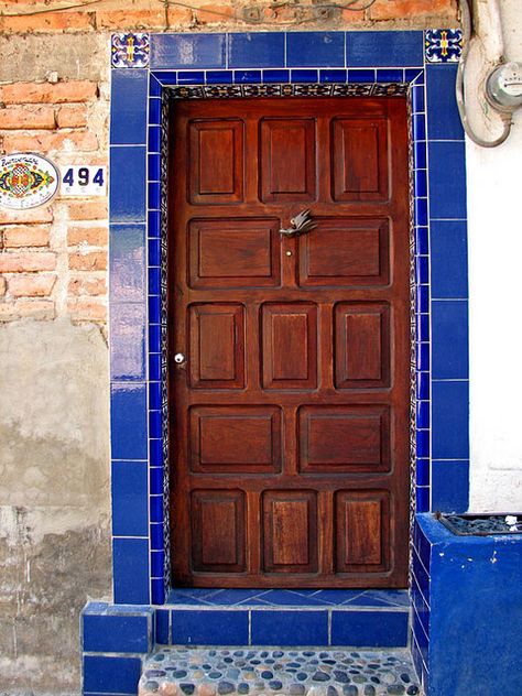 Pebble stone steps and tile door frame. #tiles #pebblestone Mexican Restaurant Decor, Mission Tile, Window Architecture, Saltillo Tile, Mexican Tiles, Talavera Tile, Puerto Vallarta Mexico, Wall Exterior, Mexican Tile