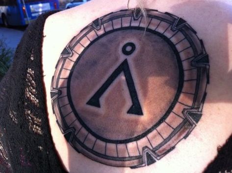 Stargate with Earth's home symbol Stargate Tattoo, Collage Tattoo, Home Symbol, Nerdy Tattoos, Stargate Universe, Atlantis The Lost Empire, Egyptian Tattoo, Music Collage, Stargate Sg1