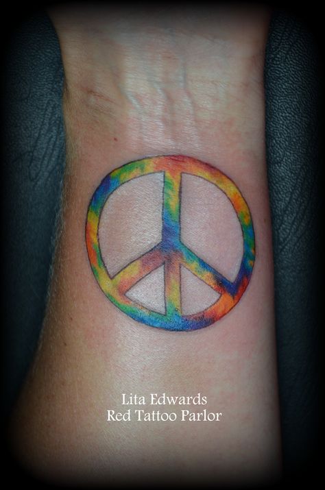 #tie #dye #peace #sign #wrist  #tattoo @lita Edwards #redtattooparlor #nashville Tattoo Ideas Peace Sign, Tie Dye Tattoo, Peace Sign Tattoo, Daisy Peace Sign Tattoo, Peace Sign And Flowers Tattoo, Flower Peace Sign Tattoo, Colorful Peace Sign Tattoo, Cute Best Friend Tattoos, Peace Sign Tattoos