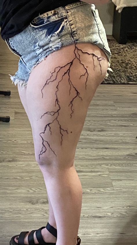 Lightning strike thight tattoo Lighting Tattoo Thigh, Lightning Tattoo Women Leg, Lightning Strikes Tattoo, Lightning Bolt Tattoo Thigh, Lightning Tattoo On Thigh, Lighting Tattoo On Thigh, Lightning Bolt Leg Tattoo, Thigh Lightning Tattoo, Lighting Leg Tattoo