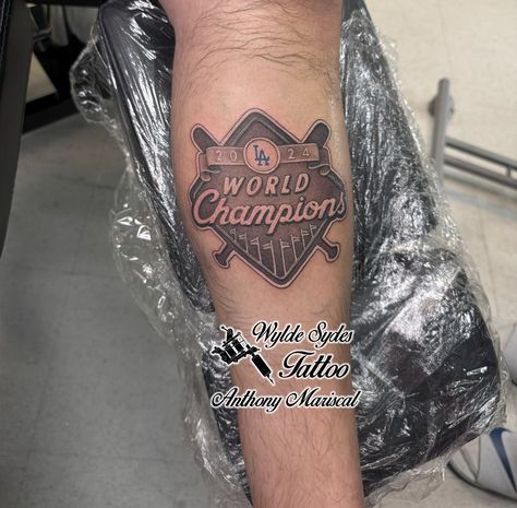 LA Dodgers World Champions Tattoo. By Artist: Anthony www.wyldesydestattoo.com #tattoo #ladodgers #wyldesydestattoo #tattoos #dodgers #blackandgraytattoo #tattoolovers Champion Tattoo, Black And Grey Tattoos, Tattoo Ideas, Tattoos, Quick Saves