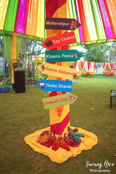 Haldi Decor Ideas, Mehendi Event, Haldi Ceremony Decorations, Mehendi Decor Ideas, Themed Wedding Decorations, Haldi Decor, Paper Props, Mehendi Decor, Wedding Photo Booth Props