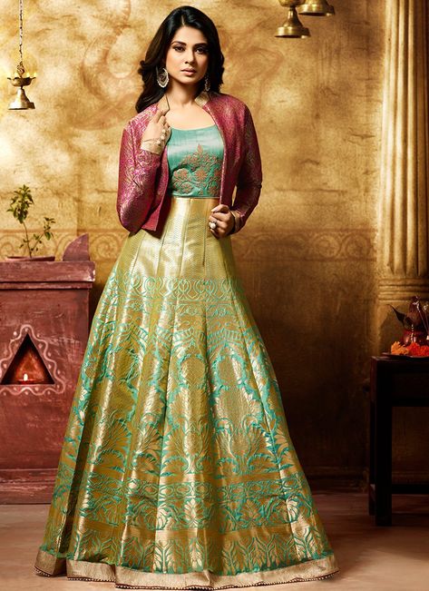 Green Blue and Pink Embroidered Banarasi Silk Anarkali features a beautiful banarsi silk anarkali alongside a handloom jacket and santoon inner and bottom. A chiffon dupatta completes the look. Embroidery work is completed with zari and kalis. Orang India, Floor Length Anarkali, Lehnga Dress, Gaun Fashion, Long Dress Design, Salwar Kamiz, Indian Gowns Dresses, Indian Gowns, Party Wear Indian Dresses