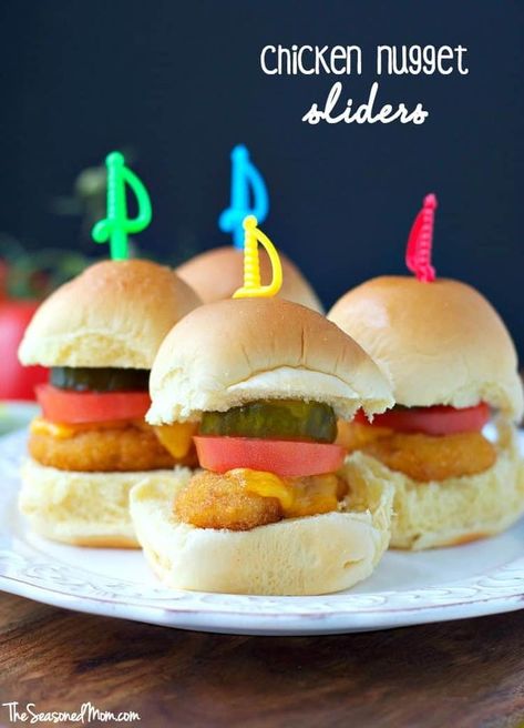 These Chicken Nugget Sliders combine crispy fried chicken, gooey cheese, and soft little buns for the ultimate game day grub! Chicken Nugget Sliders, Snacks To Share, Party Chicken, Baked Chicken Nuggets, The Seasoned Mom, Appetizer Picks, Chicken Sliders, Chicken Nugget, Crispy Fried Chicken