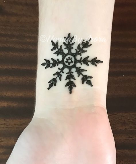 Snowflake henna design Snowflake Tattoo On Hand, Christmas Henna Design, Christmas Henna, Winter Henna Design, Snowflake Stick And Poke, Small Snowflake Tattoo Wrist Snow Flake, Henna Palm, Christmas Tattoo, Simple Henna