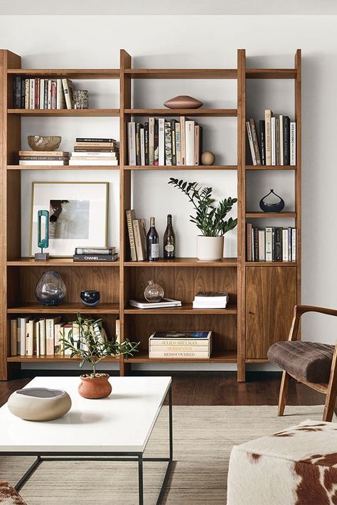 Functional and elegant – a well-chosen contemporary designer bookcase allows for the convenient storage of books and collectables whilst creating a sleek centrepiece. #bookcase #bookshelf #Bookshelves #bookcaseidea #bookshelfidea #Bookshelvesidea #bookcasedesign #bookshelfdesign #Bookshelvesdesign #luxuryfurniture #luxuryinteriordesign #interiordesign #designtrends #luxurydesign #interiordesignideas #designideas #luxuryinteriors #furnitureideas Small Living Room Furniture, Modern Wall Units, Furnitur Ruang Keluarga, Living Room Wall Units, Bookshelves In Living Room, Modern Bookcase, Room Shelves, Living Room Bookcase, Modern Shelving