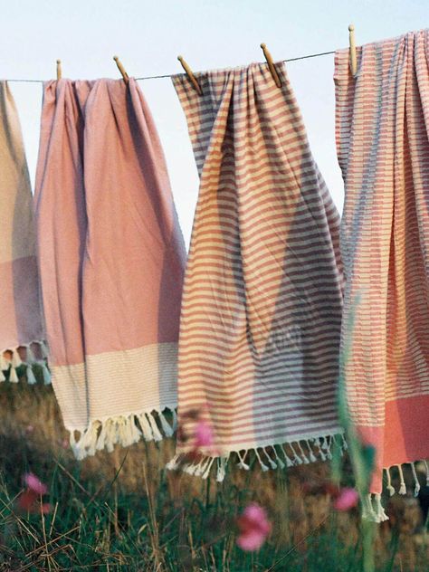 Sorrento Hammam Towel in Vintage Pink by Bohemia Design is a classic stripe cotton towel reminiscent of childhood beach holidays and jaunty sunshades. Produced by a family of weavers in Turkey using locally harvested cotton, the Sorrento Hammam Towel is beautifully soft yet durable. We love the versatility of the Sorrento Hammam Towel which is lightweight, highly absorbent, and quick-drying. The perfect travel companion that is easy to pack, Hammam Towels make for handy tablecloths, throws and picnic blankets, as well as pool or beach coverups. Each Bohemia Hammam Towel comes with a free cotton drawstring travel bag. If you would prefer to not receive the free drawstring bag, please leave us a note on checkout.