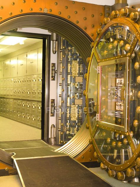 Vault door leading to safety deposit boxes in commercial bank building interior, Chicago, Illinois, USA — federal reserve, metal - Stock Photo | #251902247 Big Safe, Safe Door, Gold Vault, Building Interior, Bank Vault, Safe Deposit Box, Bank Safe, Bank Building, The Heist