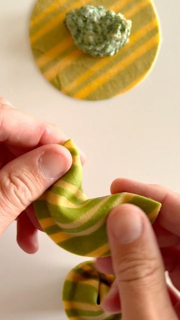 Jon Bennion on Instagram: "Want to know how to make multi-colored pasta? I have a whole story highlight (first one you see) that shows the process for one-sided pasta sheets, just like you see here with this two-colored cappelletti. So satisfying to cut those perfect circles, fold to align the sides, dimple the fat filling end, and bring the ends together into a circle. #pasta #ravioli #cappelletti #italianfood #homechef #italy #pastafresca #freshpasta #ilovepasta" Colorful Ravioli, Ravioli Design, Pasta Color, Pasta Ravioli, Colored Pasta, Pasta Shop, Presentation Techniques, Pasta Party, Pasta Making