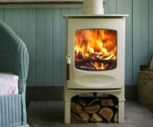 C-Four Wood Stove, by Charnwood.  a white wood stove, now there's an idea. Charnwood Stove, Store Stand, Wood Burners, Log Burner, Stove Fireplace, Wood Burner, Cool Ideas, Wood Burning Stove, Wood Burning Fireplace