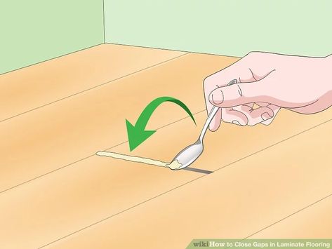 3 Ways to Close Gaps in Laminate Flooring - wikiHow Laminate Floor Repair, Laminate Flooring Diy, Laying Laminate Flooring, Installing Laminate Flooring, Mobile Home Makeover, Vinyl Laminate Flooring, Lvp Flooring, Laminate Floors, Flooring Tools