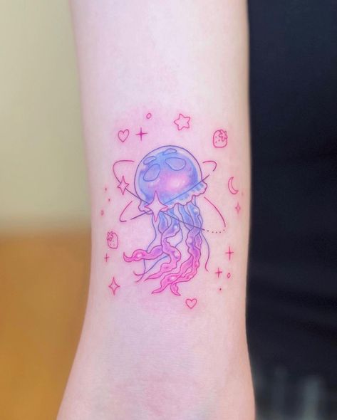 Tattoo by @tattooist_yeonnie on Instagram, who is based in New York City, USA. Pink Jellyfish Tattoo, Jellyfish Tattoo Cute, Cute Colored Tattoos, Space Tattoos For Women, Jellyfish Space Tattoo, Pastel Tattoo Ideas, Spongebob Jellyfish Tattoo, Cute Color Tattoos, Cute Pastel Tattoo