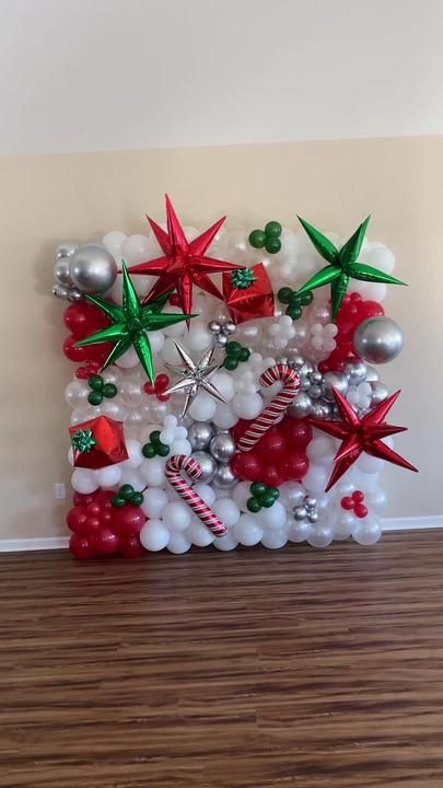 Christmas balloon wall! #balloondecor #balloonwallbackdrop #balloonart... | Balloon Wall | TikTok Christmas Balloon Wall, Christmas Balloons, Balloon Wall, Balloon Art, Christmas Wall Art, Balloon Decorations, Balloons, The Creator, Wall Art