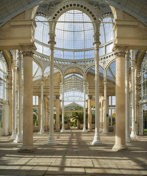 A Dale Goffigon photograph of Syon Park’s Great Conservatory hangs over a William Yeoward buffet. Christopher Spitzmiller lamps flank a spring selection of Paul Arnhold vases. The sunflower works are by Christian Brechneff. #interiordesign #decoration #homedecorstore #photography Glass Conservatory, Wood Moulding, Lacquer Furniture, Study Photography, Neo Classical, Parsons School Of Design, Wood Molding, Cute Room Decor, Historical Architecture