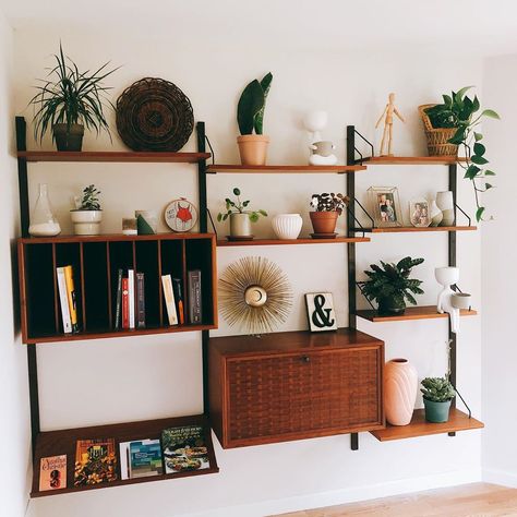 Floating shelves save floor space and fill empty walls.   #fluxmodern #midcenturymodern #midcentury #shelves #floatingshelves #vintage #furniture Mid Mod Shelving, Mid Century Modern Open Shelf, Modern Floating Shelves Living Room, Midcentury Shelves, Mid Century Modern Floating Shelves, Mid Century Open Shelf, Modern Shelf Decor, Mid Centey Modern Wall Shelves, Shared Home Office