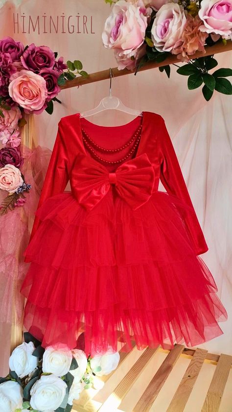 Red velvet dress with long sleeves, back decollete and pearl details Red Velvet Dress, Pearl Details, Girls Christmas Dresses, Dress Christmas, Tutus For Girls, Dress With Long Sleeves, Tutu Dress, Christmas Dress, Velvet Dress