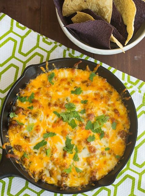 Queso Fundito | browneyedbaker.com #recipe #CincodeMayo Queso Fundito, Easy Appies, Queso Fundido Recipe, Fundido Recipe, Asian Entrees, Cream Cheese Enchiladas, Enchilada Dip, Bunco Ideas, Chicken Enchilada Dip