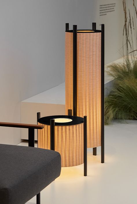 Experience the timeless charm of the 60s with Rol portable light fixtures. Inspired by nostalgia and rooted in minimalism, Rol exudes simplicity and elegance in its cylindrical form and wooden legs.  Manufactured in Spain, by Milan. Minimal Lamps, Minimal Lamp, European Lighting, Decorative Lamp Shades, Portfolio Inspiration, Floor Standing Lamps, Geometric Decor, Unique Fabric, Portable Lamps