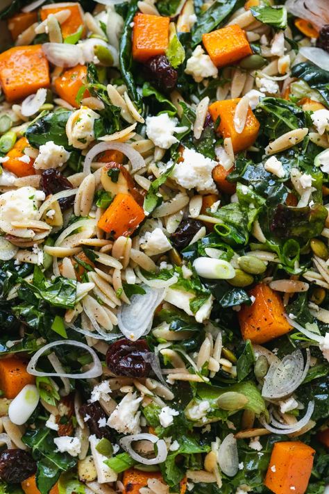 This hearty, beautiful, Fall Orzo Salad showcases all the best parts of autumn! We've got whole wheat orzo, maple roasted butternut squash, hearty kale, feta, dried cherries, toasted almonds and pepitas, parsley, shallots, scallions, and a maple dijon apple cider vinaigrette. It's filled with loads of texture and flavor, and the best part is, it can be made ahead of time, making it the perfect addition to any holiday table or prep-ahead lunch! #fallsalad #orzo #salad #holiday #vegetarian Harvest Orzo Salad, Butternut Squash Toast, Kale Feta, Fall Lunch, Apple Cider Vinaigrette, Orzo Salad Recipes, Cider Vinaigrette, Holiday Salads, Dijon Vinaigrette