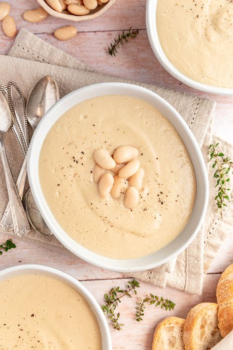 Creamy Cauliflower White Bean Soup (with Cannellini Beans and Tahini) Cauliflower White Bean Soup, Canneli Beans, Soup With Cannellini Beans, Bean And Potato Soup, Cannellini Beans Soup, Garlic Chickpeas, Cannellini Beans Recipes, Creamy Soup Recipes, Homemade Crackers