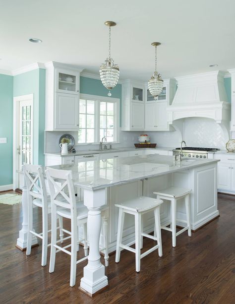 If there’s anything better than a crisp white kitchen, it’s one with a little bit of turquoise in the mix! Love how the pretty paint color (Benjamin Moore Wythe Blue HC-143) complements… Beach Kitchens, House Of Turquoise, Beach House Kitchens, Kitchen Island With Seating, Island With Seating, Kitchen Island Design, Large Kitchen, Counter Tops, Kitchen Remodel Idea