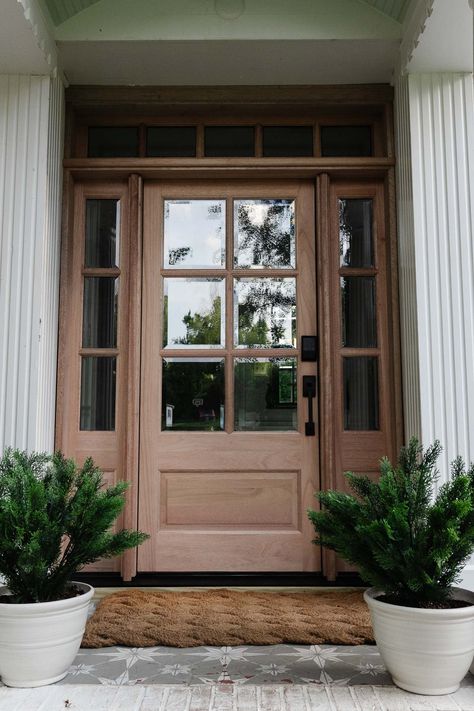 Traditional Front Door Paint Color Ideas Recommended by Designers Wooden Front Door White House, Front Door Brown Paint, Exterior Door Stain Colors, Brown Front Door Paint Colors, Walnut Stained Front Door, Stained Fiberglass Front Door, Brown Front Door Paint, Door Paint Color Ideas, Brown Front Door