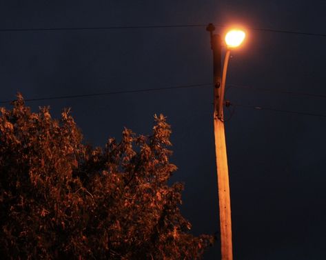 a streetlight at night Midwest Neighborhood Aesthetic, Small Town Vampire Aesthetic, Indie Nostalgia Aesthetic, Small Town Cryptid Aesthetic, Mysterious Town Aesthetic, 90s Midwest Aesthetic, 90s Town Aesthetic, Pinegrove Aesthetic, Creepy Small Town