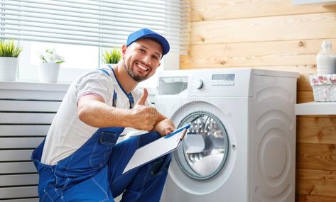 Working man plumber repairs washing machine in laundry stock photo Washing Machine Repair Service, Bosch Washing Machine, Fully Automatic Washing Machine, Whirlpool Washing Machine, Samsung Washing Machine, Dryer Repair, Washing Machine Repair, Automatic Washing Machine, Refrigerator Repair