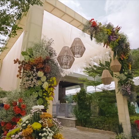 Colourful floral arch with a tunnel of layered fabric and an entrance installation Floral Tunnel, Tunnel Entry For Wedding, Flower Tunnel Entrance, Wedding Tunnels, Floral Arch Mandap, Floral Arch, Entrance, Photo And Video, Instagram Photo