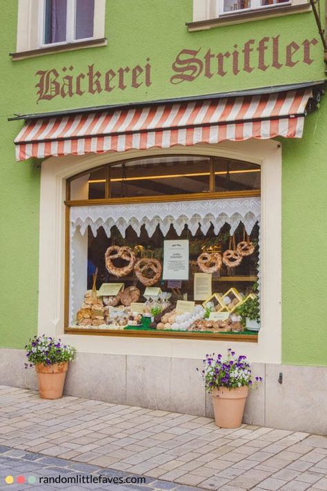 Fresh pretzels and other baked goods in the window of Bäckerei Striffler at Untere Schmiedgasse 1, 91541 Rothenburg ob der Tauber, Germany (baecker-striffler.de). Rothenburg, with its well-preserved medieval old town, sits in the district of Ansbach of Mittelfranken, in the Franconia region of Bavaria, about 41 miles west of Nuremberg. Bakery Window Display, Canton Mississippi, Dutch Bakery, German Bakery, German Town, Bakery Store, Shop Facade, Rothenburg Ob Der Tauber, Storefront Design