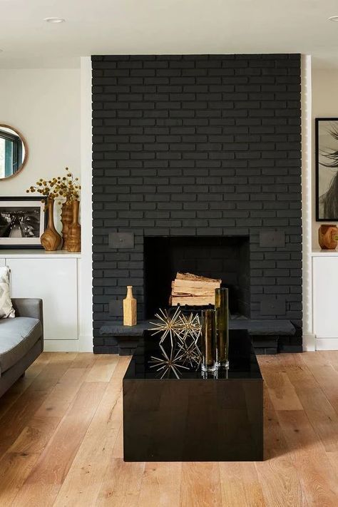 You HAVE TO check out these black paint colors for walls and black painted bricks! They’re SO GOOD! Like Noir by Valspar. I'm so glad I found these black paint colors from Sherwin Williams for adding black paint colors for front doors, definitely going to use these decor ideas for the home to add black painted cabinets in my interior design! Pinning these Benjamin Moore black paint colors for the bedroom for later! Flat Black Fireplace, Painting A Brick Fireplace Black, White Room Black Fireplace, Paint Black Fireplace, Painting House Black, Black Brick Fireplace With Built Ins, Cracked Pepper Fireplace, White And Black Brick Fireplace, Charcoal Color Fireplace