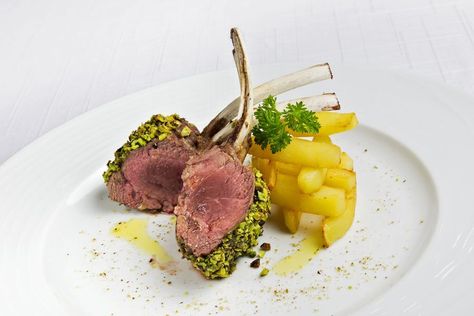 Pistachio Crusted Rack of Lamb Recipe Crusted Lamb Rack, Lamb Rack, Easter Dinner Menus, Crusted Rack Of Lamb, Ribeye Roast, Traditional Easter, Rack Of Lamb, Beef Wellington, Beef Ribs