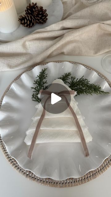 Cheryl Brown on Instagram: "o h  c h r i s t m a s  t r e e 🌲
-
Simple but pretty…..i’ve always wanted to have a go at making Christmas tree napkins…. 
-
I think these may be my go to this year 🌲
-
Napkins @layeredlounge 
Ribbon @amazonuk type ‘link’ for the ribbon DM
Ruffle plates @sweetpeaandwillow 
Placemats @layeredlounge 
-
Happy Friday xx
-
-
-
#christmasnapkins #christmastable #chritsmastabledecor #christmasdiy #chritsmastime" Red And Gold Christmas Table Decorations Centerpiece Ideas, Christmas Plate Decorating Ideas, Christmas Tree Folded Napkins, Setting Table For Christmas, Napkins In Glasses Ideas, New Years Table Setting Ideas, Christmas Table Scapes Ideas Holidays, Napkins With Ribbon, Christmas Napkin Ideas