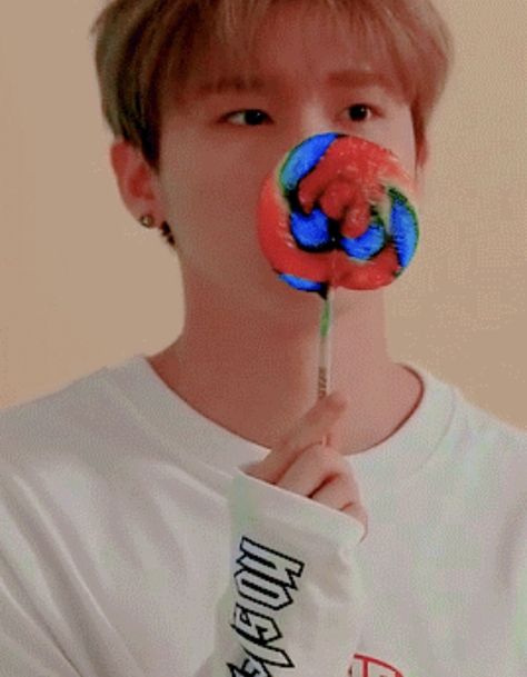 Sweet boy holding a lollipop Eating Candy Pose Reference, Lollipop Reference Drawing, Eating A Lollipop Reference, Lollipop Pose Reference, Eating Lollipop Pose, Holding Lollipop Reference, Lollipop Reference, Lollipop Pose, Eating Lollipop