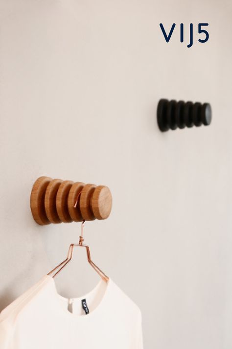 Alf is a wall hook adapted to accommodate up to five clothes hangers at the same time. The hook of each standard hanger fits perfectly into the cut-out grooves that separate the hangers neatly from each other at the same time. Ideal for airing clothes, for example, or for hanging them ready for the next day. Design by Gustav Rosén. #Hook #Alf #Vij5 #Wood #Clotheshook #Practical #Consciously #Swedisch #Nordic #Design #Spacesaving #Wallhook #Hanger #Oak #Black Wall Hangers For Clothes, Camper Curtains, Air Clothes, Astuces Diy, Dye Ideas, Hanger Design, Clothes Hooks, Clothes Hangers, The Hook