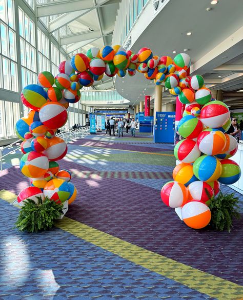 Welcome to the party under the rainbow arch! 🌈🏐 Where every beach ball is a burst of joy, setting the tone for an unforgettable event. 

#beachball #beachballs #colorfuldecor #beachdecor #eventdecor #beach #balls #arch #entrance #entrancearch #entranceway #colorfulballs #rainbow #florida #orlando #customdecor #creative #unique #welcome Beach Ball Arch Diy, Beach Ball Arch, Ball Arch, Arch Entrance, Rainbow Arch, Beach Balls, Florida Orlando, Under The Rainbow, Beach Events