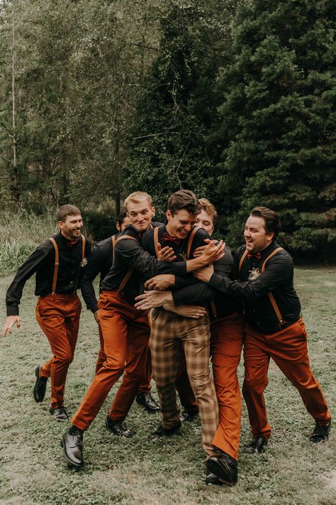 Red And Orange Wedding Groomsmen, October Wedding Mens Suits, Hippy Wedding Ideas, Unconventional Groom Attire, Groomsmen Fall Wedding Attire, Cozy Fall Wedding, Burnt Orange Groomsmen Attire, Fall Wedding Groom, Hippie Wedding Ideas