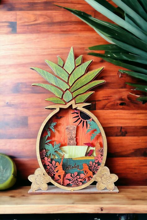 Aloha Pineapple Wall Decor 🍍 - Handcrafted in Oregon 🌲 - Choose Your Size! Transform your space with our unique layered wood art, inspired by the tropical vibes of Hawaii. Whether adorning your home, tiki bar, or bringing summer to your bedroom or bathroom, this exquisite piece radiates warmth and style. Each creation comes complete with a convenient sawtooth hanging bracket for easy display. 🖼️ Customizations: - Colorful Personalization: Want a different color scheme? Just let us know, and w Layered Wood Art, Pineapple Wall Decor, Wood Pineapple, Hawaiian Home Decor, Pineapple Wall Art, Luau Decorations, Hawaiian Homes, Tiki Decor, Tiki Bar Decor