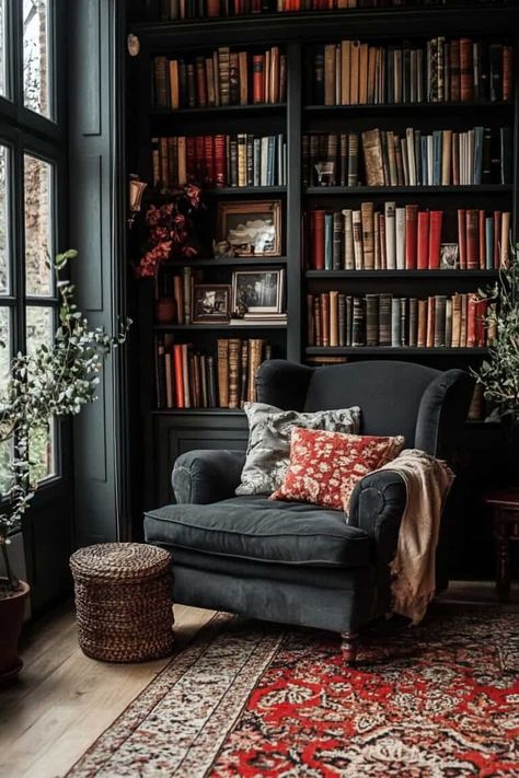 Elegant Dark Academia Home Decor: 15 Ideas & Tips Dark Painted Bookcases, Dark Academia Minimalism Interior, Reading Corner Dark Academia, Gothic Home Library Ideas, Dark Academia Armchair, Reading Room Dark Academia, Reading Nook Dark Academia, Dark Academia Bookcase, Dark Academia Shelves