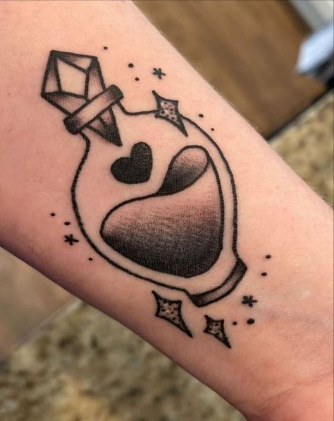 Love potion bottle by Cookie Lee at Norfolk Ink in Norfolk VA#tattoo #tattoaftercare #tattoocare Love Potion Tattoo, Bottle Drawings, Va Tattoo, Potion Tattoo, Crystal Ball Tattoo, Love Potion Bottle, Sarah Tattoo, Sleeve Inspiration, Neo Tattoo