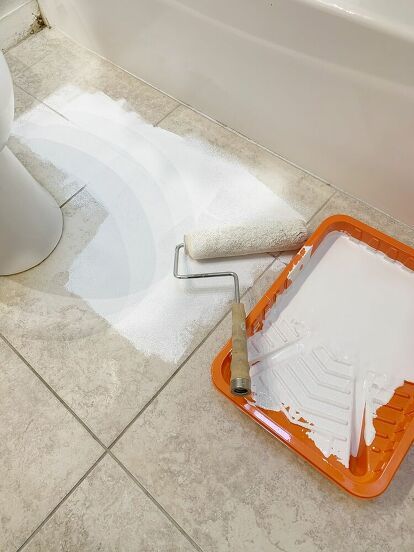 Are you looking for a quick and cheap way to make over your bathroom? try this easy DIY idea and paint over old tile. This simple upgrade will make your builder grade bathroom look more expensive ad is perfect for old tiles and small bathrooms. check out the before and after photos for inspiration. #diy #bathroom #makeover Bathroom Floor Makeover, Diy Bathroom Floor, Builder Grade Bathroom, Wood Valances For Windows, Old Tiles, Diy Dining Room Table, Floor Makeover, Building A Kitchen, Old Bathroom