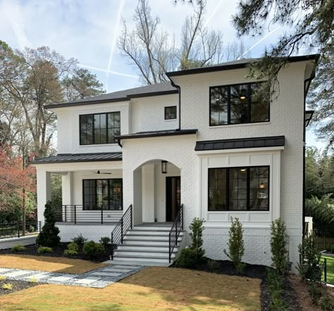 Black House White Stone Exterior, White House With Black Brick Foundation, Beige House With Black Windows, Black And White Colonial Exterior, White Painted Brick Exterior Black Trim, White Brick Modern House, White Brick House Exterior Black Windows, White Brick Black Windows, White Brick House Black Trim