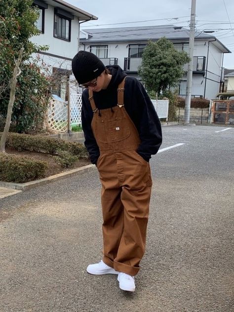 Instagram📸   @knsk__m Beige Overalls Outfit Men, Carhartt Mens Overalls Outfit, Carhartt Dungarees Outfit Men, How To Style Brown Overalls, Guy Overalls Outfit, Baggy Overalls Outfit Men, Overalls Outfit Men Street Styles, Mens Dungarees Outfit, Brown Overalls Outfits Men