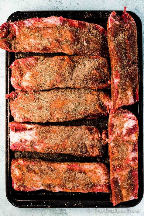 SAVE FOR LATER! Crockpot Beef Ribs are easy to make and insanely delicious.  All you need are some beef back ribs, a few spices, and your favorite BBQ sauce and you will have a dinner recipe your family will rave about. #theendlessmeal #beef #beefribs #beefbackribs #bbqribs #dinnerrecipes #crockpot #crockpotrecipes #slowcooker #slowcookerrecipes #ribs #glutenfree #bbq Beef Back Ribs Crockpot, Crockpot Beef Spare Ribs, Crockpot Beef Ribs Recipes, Beef Ribs In The Crockpot, Beef Spare Ribs Crock Pot, Beef Back Ribs Slow Cooker, Beef Ribs Crockpot Slow Cooker, Beef Ribs In Crockpot, Boneless Beef Ribs Crockpot